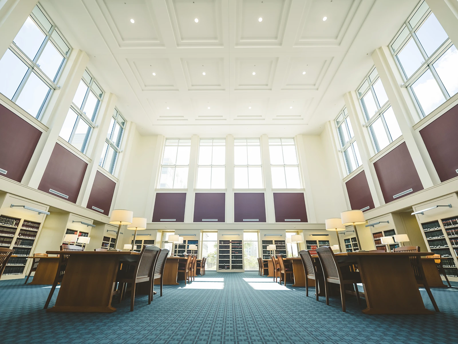 Prospective students conversing with FIU Law personnel