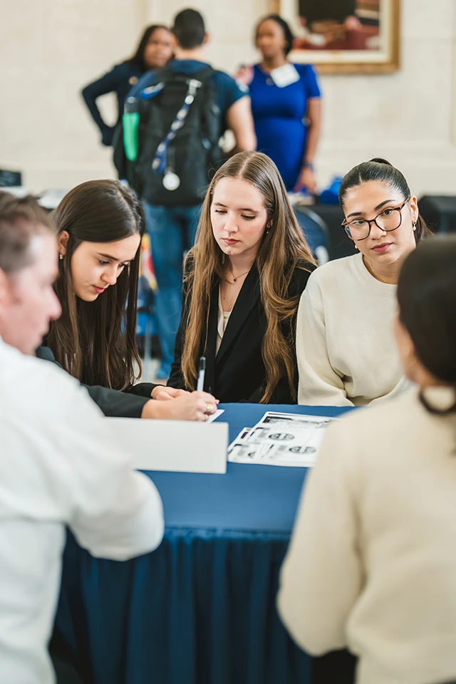 Students meet with companies at the 2026 College of Law Career Fair